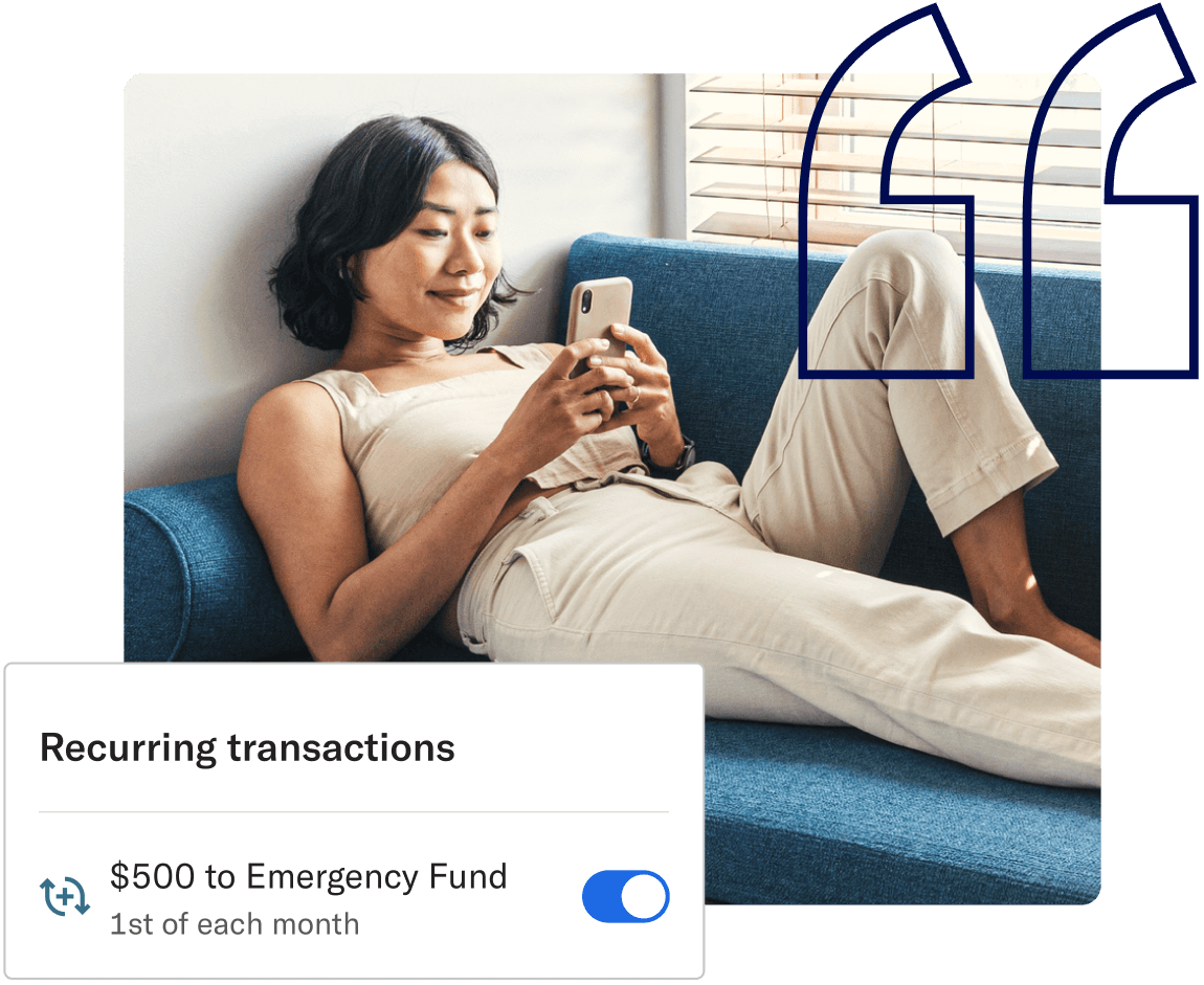 Person on a phone next to a user interface card showing recurring transaction of $500 to emergency fund toggled on.